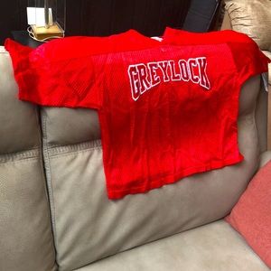 Lacrosse/football cutoff style practice jersey. Men’s Small/Med.